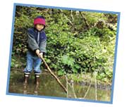 Picture of girl splashing with a stick
